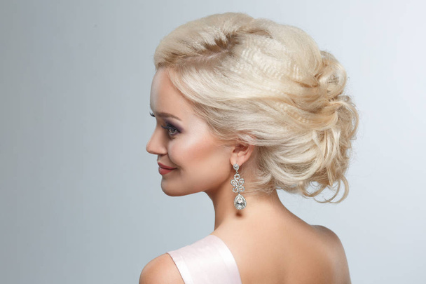 Close up of wedding hairstyle on blonde woman  - Фото, зображення