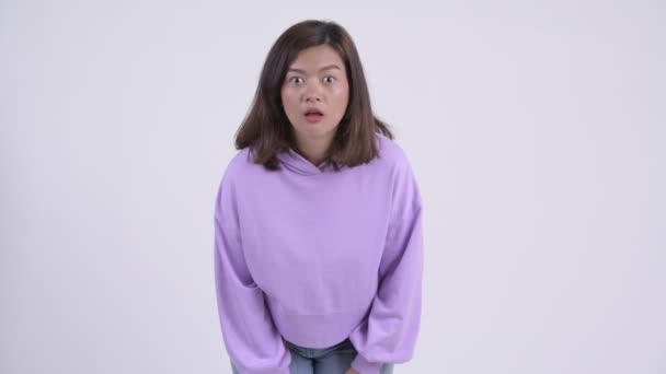 Young stressed Asian woman getting bad news - Filmagem, Vídeo