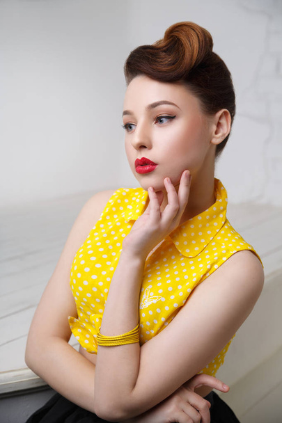 Portrait of young woman in pin up style - Fotografie, Obrázek