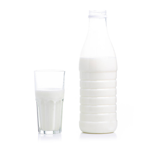Plastic bottle milk and glass of milk - Φωτογραφία, εικόνα