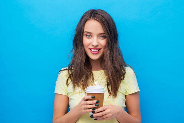 young woman or teenage girl with coffee cup - Fotoğraf, Görsel
