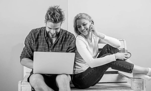 Surfing web together. Couple cheerful spend leisure with laptop surfing web watch video. Couple in love relaxing surfing internet for fun. Family leisure. Modern young people leisure internet surfing - Foto, Imagen