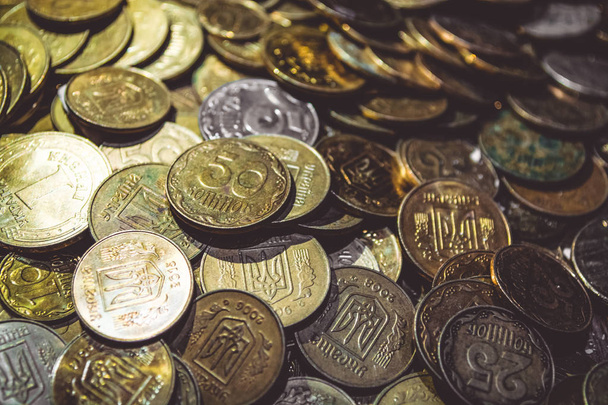 A lot of gold coins. Finance, business, money. Hryvnia. Profit. Currency. Texture and background. - Fotoğraf, Görsel