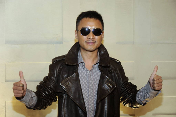 O ator chinês Zhang Hanyu é visto na abertura da boutique Burberry na Rua Jinbao, em Pequim, China, quinta-feira, 30 de abril de 2009
. - Foto, Imagem