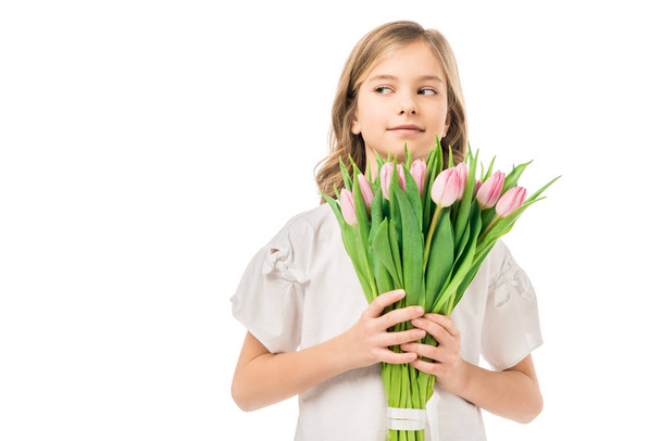 cute child holding beautiful bouquet of pink flowers isolated on white - Fotografie, Obrázek