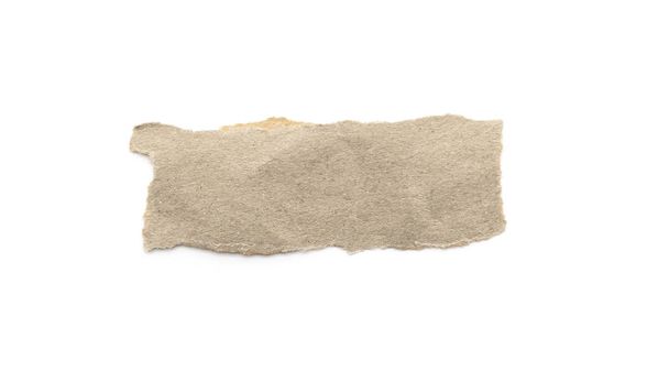 Recycled paper craft stick on a white background. Brown paper torn or ripped pieces of paper isolated on white with clipping path. - Photo, Image