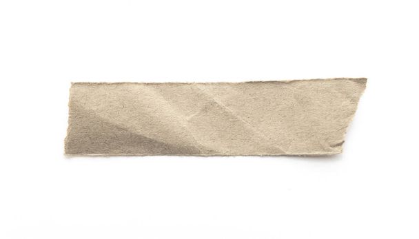 Gerecycled papier ambachtelijke stok op een witte achtergrond. Bruin papier gescheurd of gescheurd papier geïsoleerd op wit met knippad. - Foto, afbeelding