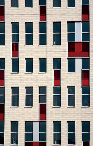 Red windows. Office building. - Photo, Image