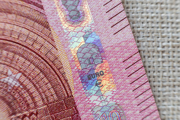 Χρήματα, busyness και οικονομικά έννοια. Λεπτομέρεια μέρος του τραπεζογραμματίου ευρώ εθνικό νόμισμα λογαριασμού. Σύμβολο του πλούτου και ευημερίας. - Φωτογραφία, εικόνα