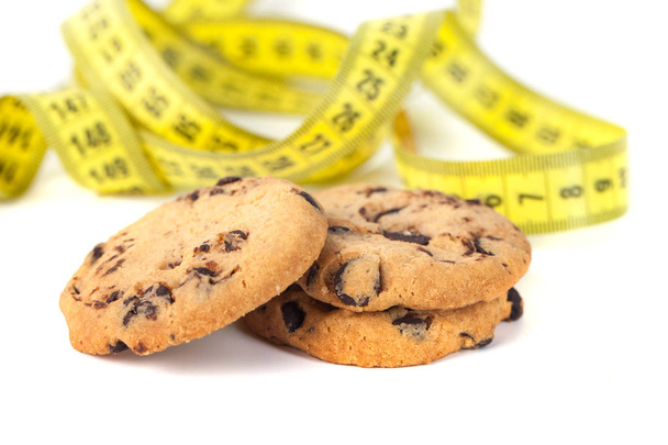 Chocolate Chip Cookie  with Measuring Tape Isolated on White, Diet Concept. - Photo, Image