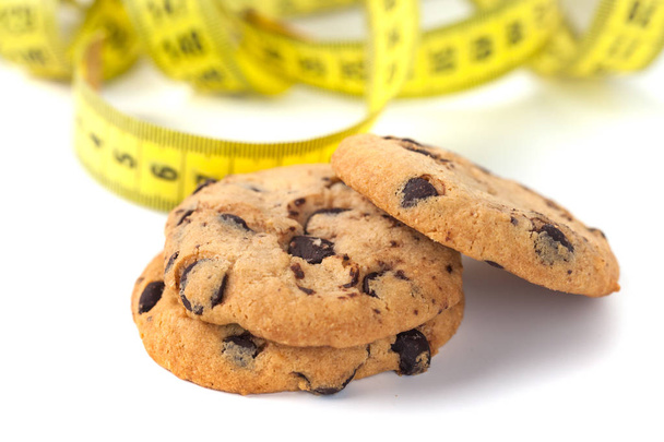 Chocolate Chip Cookie  with Measuring Tape Isolated on White, Diet Concept. - Fotoğraf, Görsel