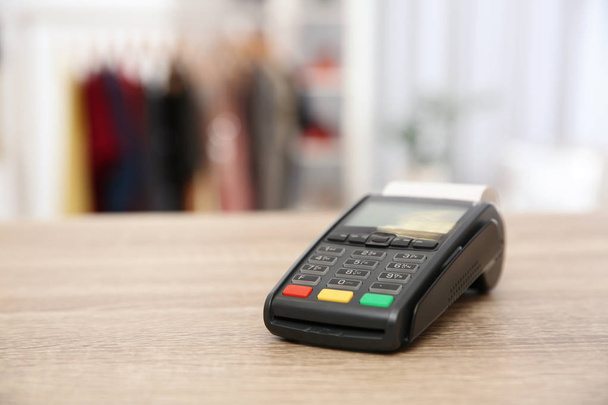 Payment terminal on counter in shop. Space for text - Fotografie, Obrázek
