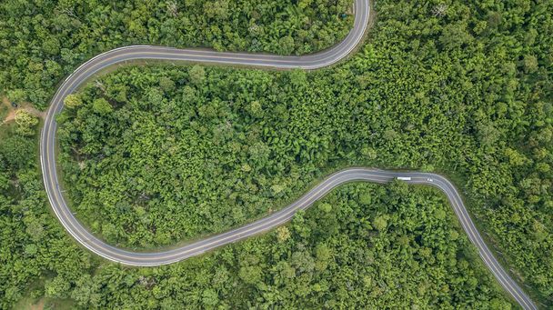 Aerial view of forest road at South East Asia, Aerial view of a provincial road passing through a forest, Thailand. - Valokuva, kuva