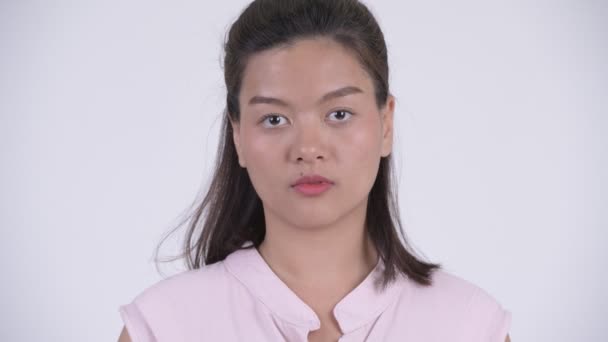 Face of young beautiful Asian businesswoman - Záběry, video