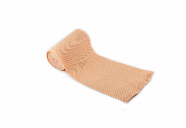 elastische Bandage medizinische Bandage Rolle isoliert auf weißem Hintergrund - Foto, Bild