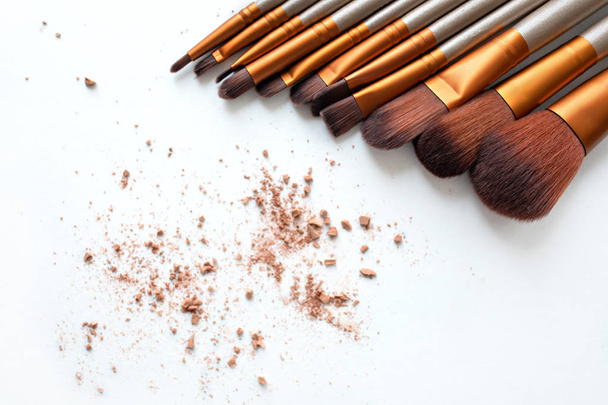 powder and makeup brushes isolated on white - Photo, Image