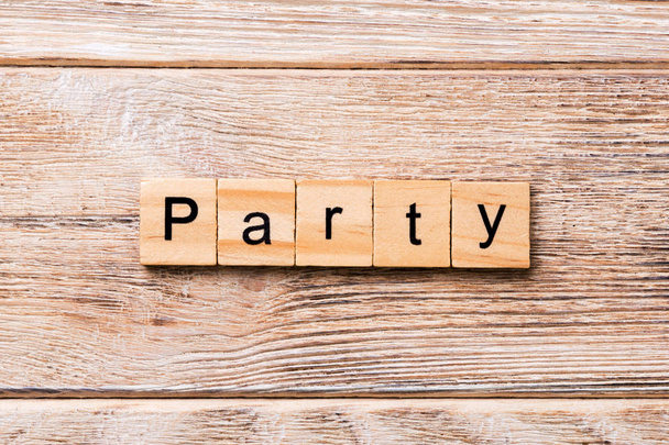 PARTY word written on wood block. PARTY text on wooden table for your desing, concept. - Foto, Bild