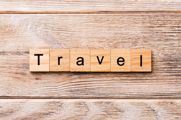 Travel word written on wood block. Travel text on wooden table for your desing, concept. - Photo, Image