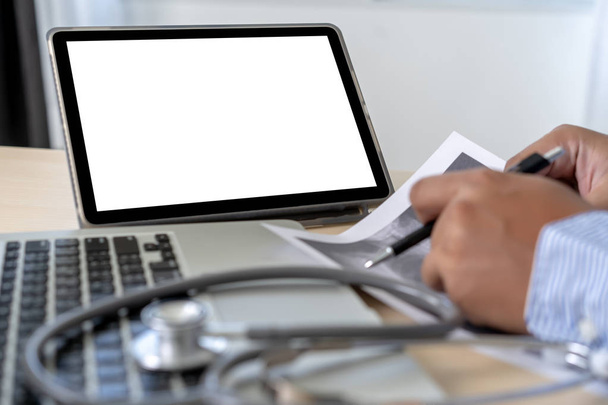 Health care writing prescription Doctor working with laptop computer - Photo, image