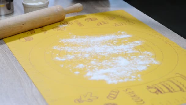 The confectioner rolls out the chocolate dough with a rolling pin. - Footage, Video
