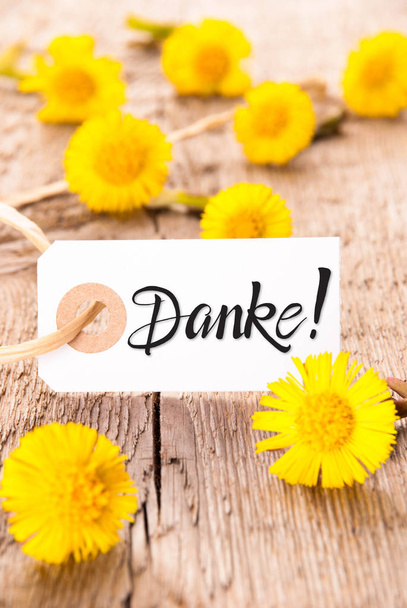 Лейбл, одуванчик, каллиграфия Danke Means Thank You
 - Фото, изображение