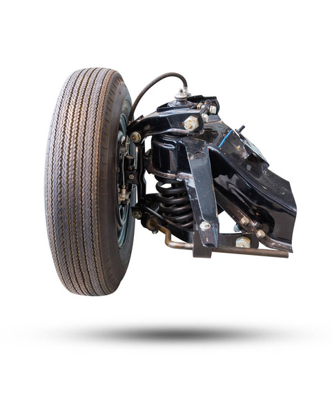Front wheel drive car new tire and Shock Absorber isolated on white background. Object with clipping path. - 写真・画像