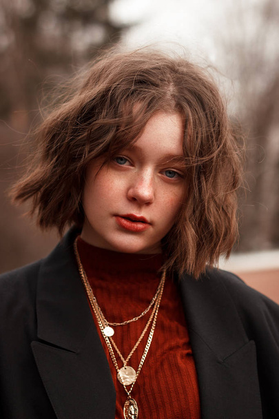 Fashion portrait of young curly girl with blue eyes, red lips and freckles - Фото, зображення