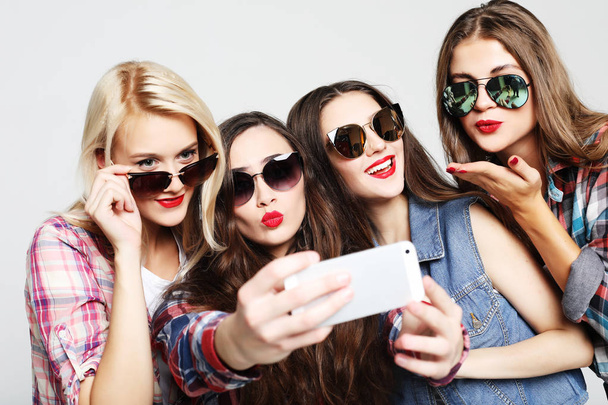 happy teenage girls with smartphone taking selfie - Valokuva, kuva