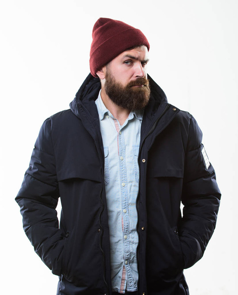 Hipster modern fashion. Guy wear hat and black winter jacket. Hipster style menswear. Hipster outfit. Stylish and comfortable. Man bearded hipster posing confidently in warm black jacket or parka - Foto, Imagem