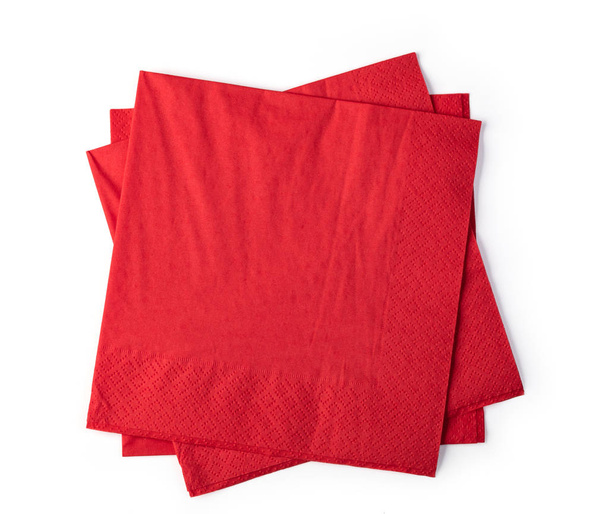 Rode papieren servet geïsoleerd op witte achtergrond - Foto, afbeelding