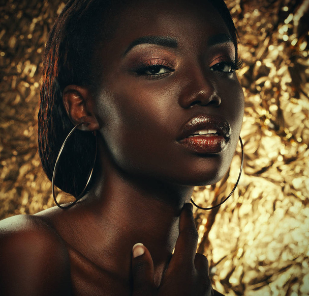 Portrait of Young African model with a beautiful makeup in studio - Fotó, kép