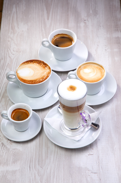 set of coffee drinks on white wooden background - Foto, Imagem