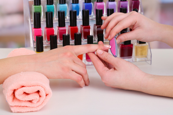 Manicure process in beauty salon - Photo, Image