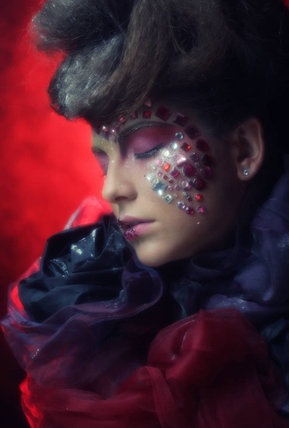 Close up portrait young woman with bright fantasy make up - Foto, Bild