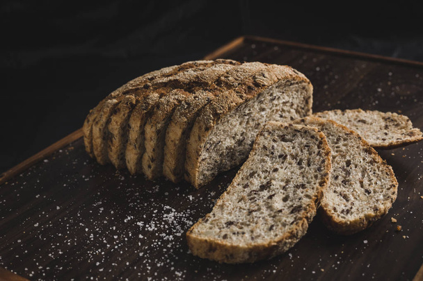 sliced grey grain bread - Fotoğraf, Görsel