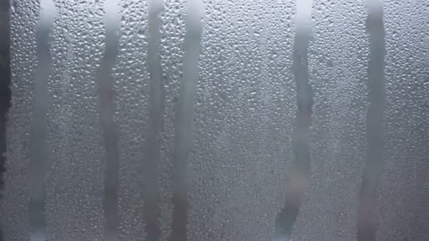 Vorst op het vensterglas in de winter - Video