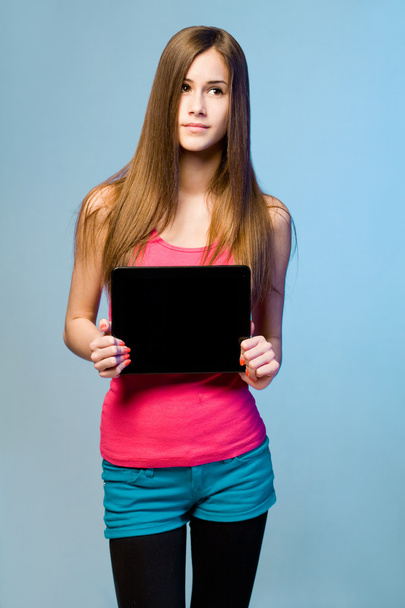 Teen cutie with tablet for copy space. - Fotó, kép