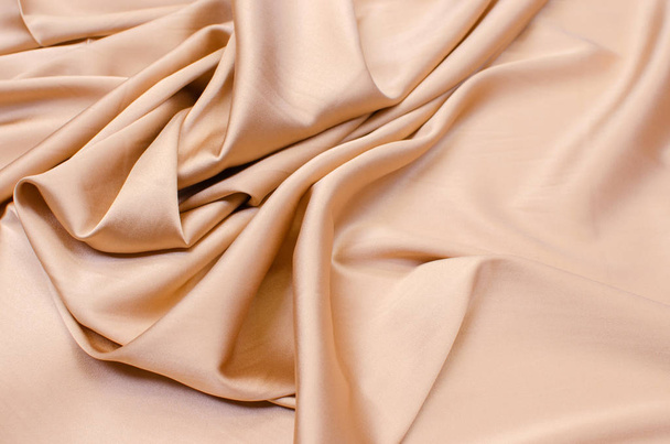 Satin silk fabric in light beige - Foto, Bild