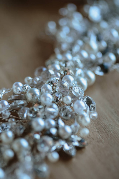 Closeup macro photo of details, workplace of decorator and creator of wedding imitation jewelry - Foto, Bild