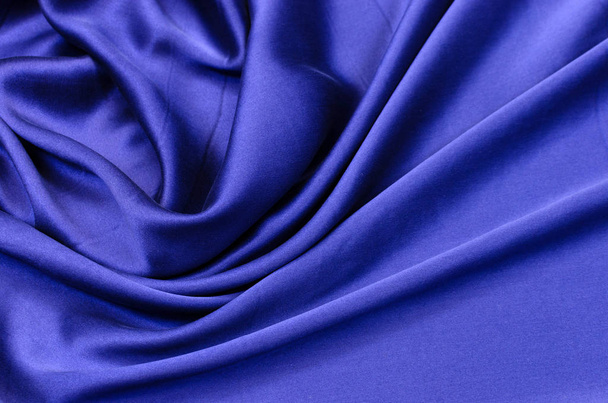 Шовк, атласна тканина синього кольору
 - Фото, зображення
