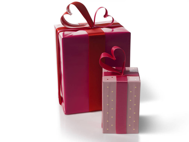 Valentine gift box with a heart ribbon on a white background - Zdjęcie, obraz