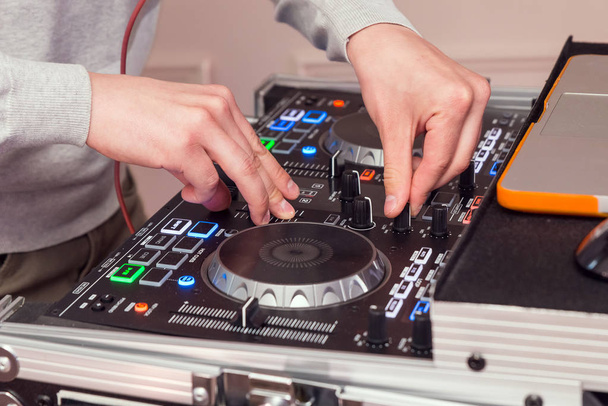 DJ hands on music mixer - Foto, immagini