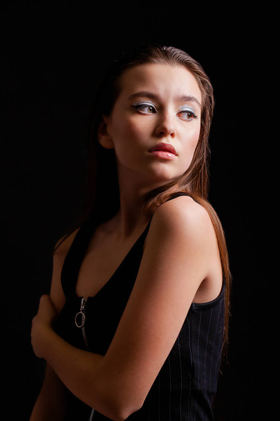 Close up Make up fashion model. Young beautiful brunette girl, on studio black wall background - Zdjęcie, obraz
