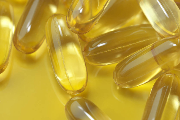 Soft gelatin capsules with omega-3 fish oil, ALA, EPA, dietary therapeutic food supplement - Foto, imagen