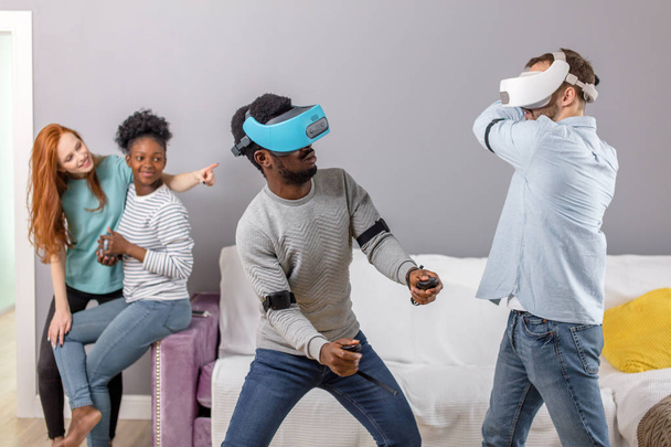 International students enjoying together with glasses of virtual reality - Fotó, kép