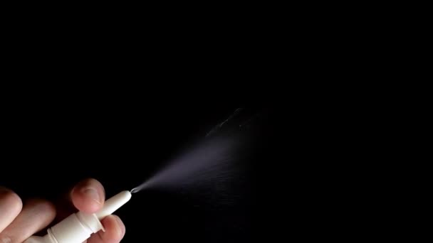 Spray do nosa odpryskami slowmo - Materiał filmowy, wideo