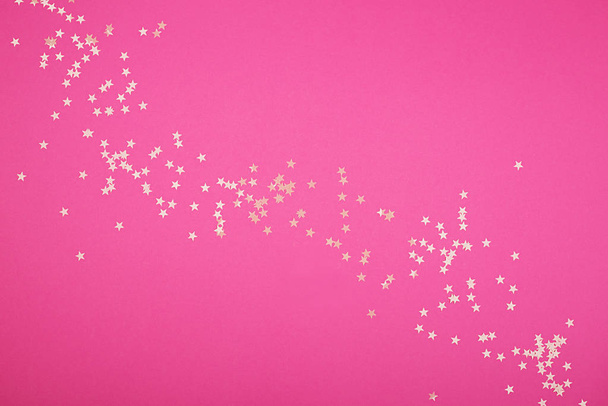 Gentle pink color background with small blazing stars. Brilliant background for your festive project. Horizontal, copy space, - Foto, Bild
