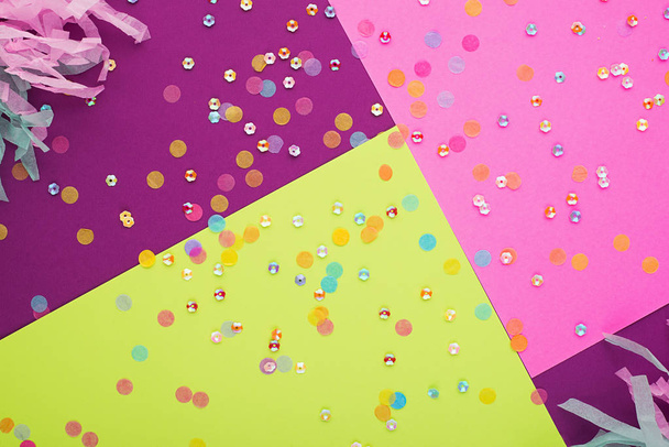 Abstract geometric festive background with sequins. Purple, pink and yellow trend colors 2019. - 写真・画像