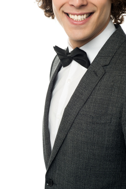 Groom in pose against white background - Foto, afbeelding