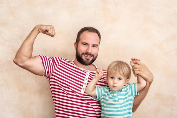 Man and child at home. Father and son having fun together. Family holiday concept. Happy Father's day - Фото, зображення